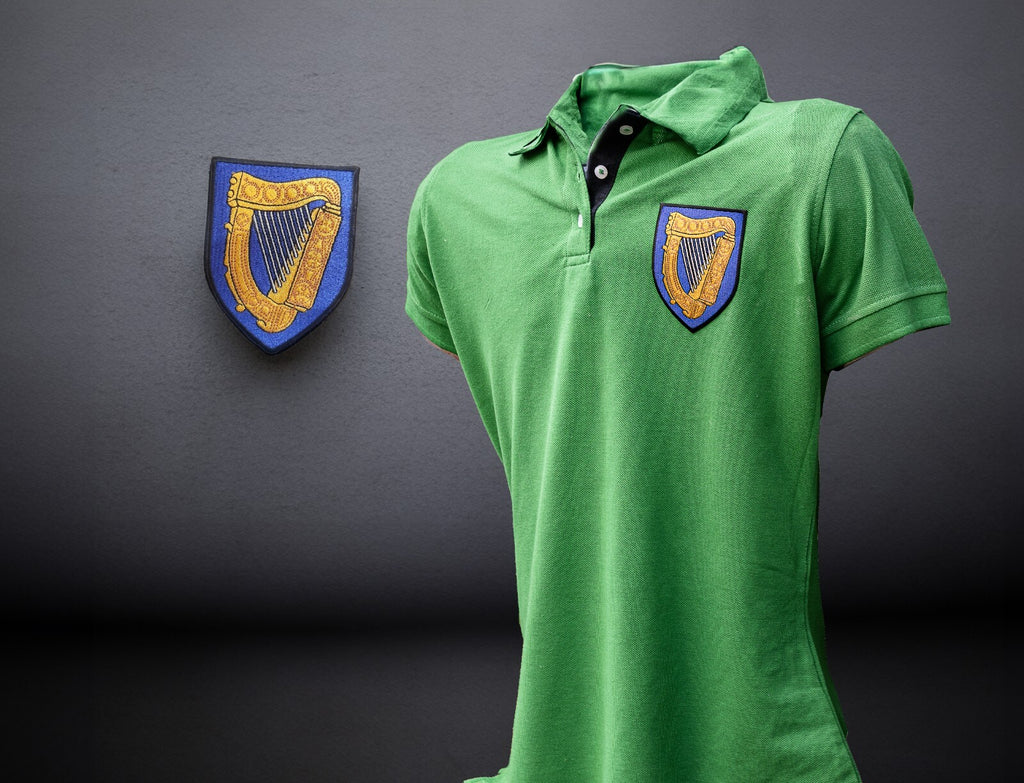 Cotton polo shirt with the Irish coat of arms harp badge embroidered on the chest