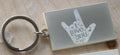 I love you hand sign engraved on a keyring with hearts
