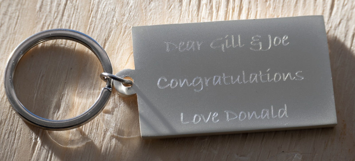 King Charles III royal cypher engraved on a silver plated keyring – view 3