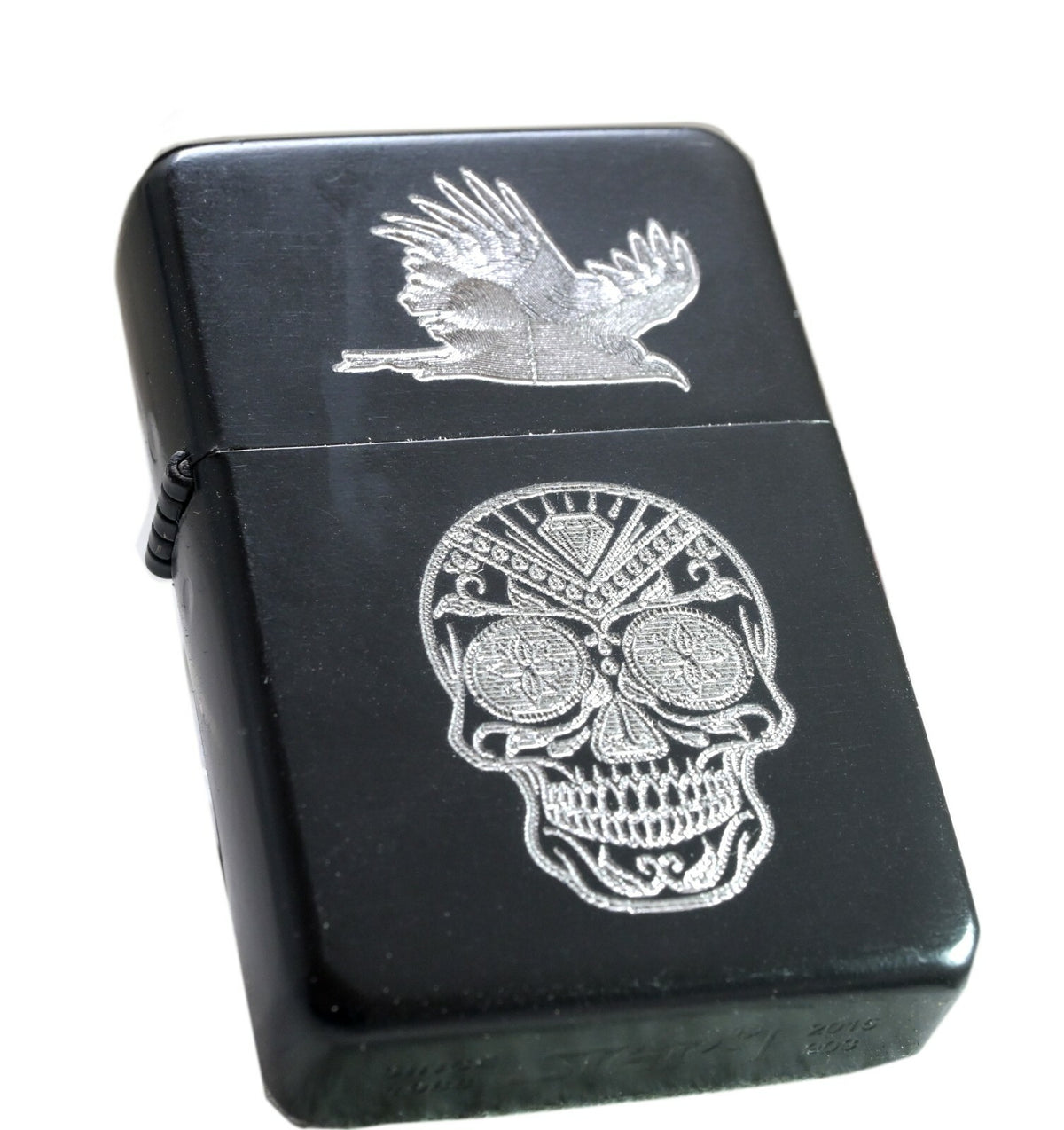Black flip-top lighter engraved with Day of the Dead sugar skull designs – view 2