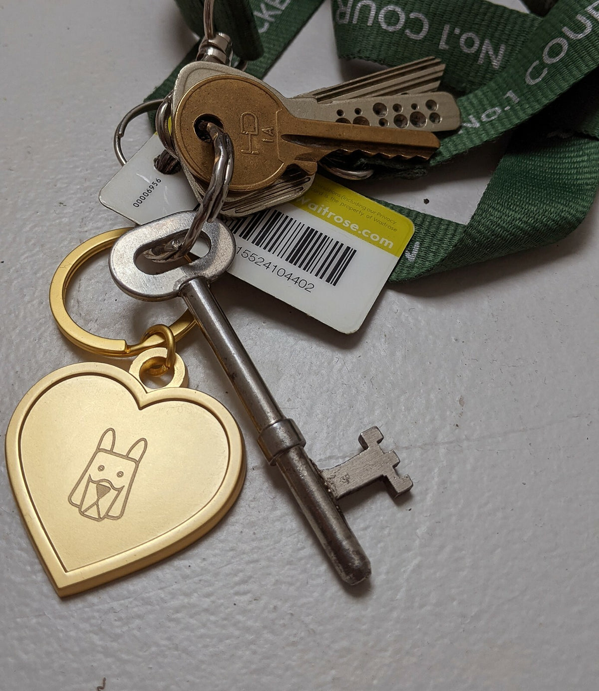 Gold heart shaped dog tag keyring engraved with a dog breed face – view 2