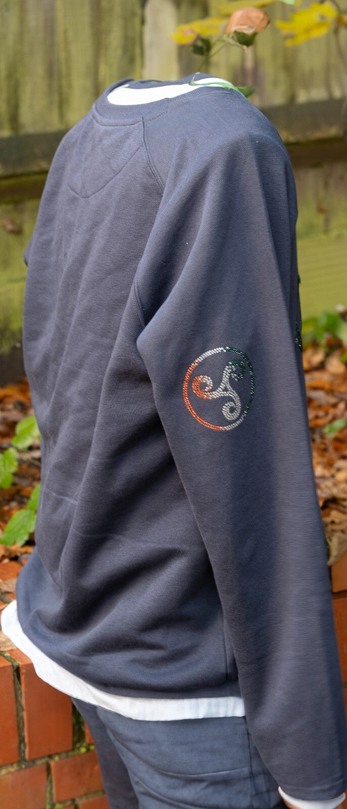 Navy jumper with a sparkling Triskelion Celtic knot in Irish tricolour rhinestones – view 4