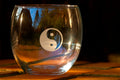 Yin Yang symbol engraved on a glass tumbler